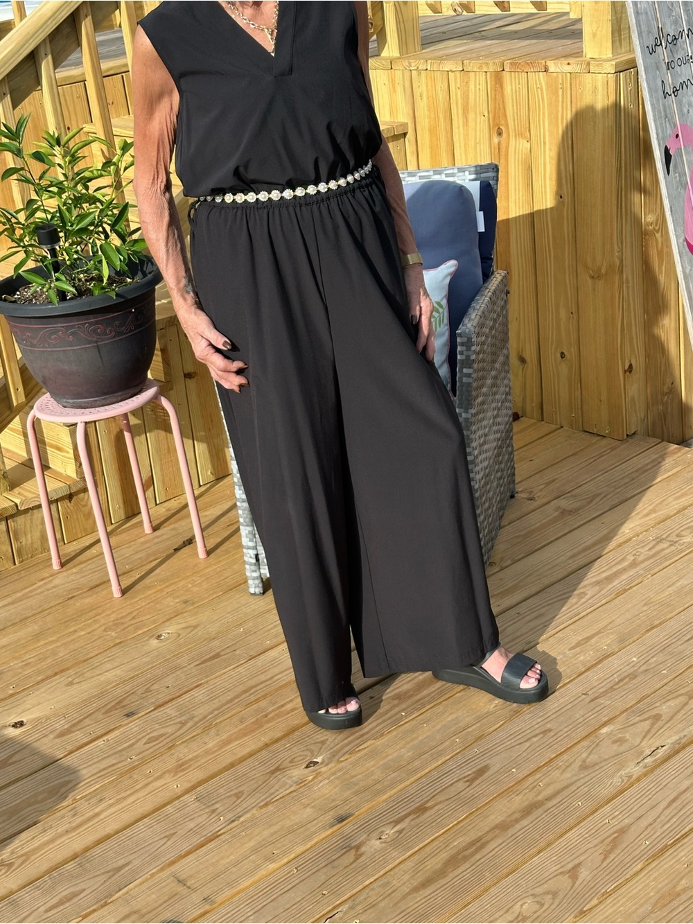 Calvin Klein black satin wide leg jumpsuit, size eight, V-neck, elegant